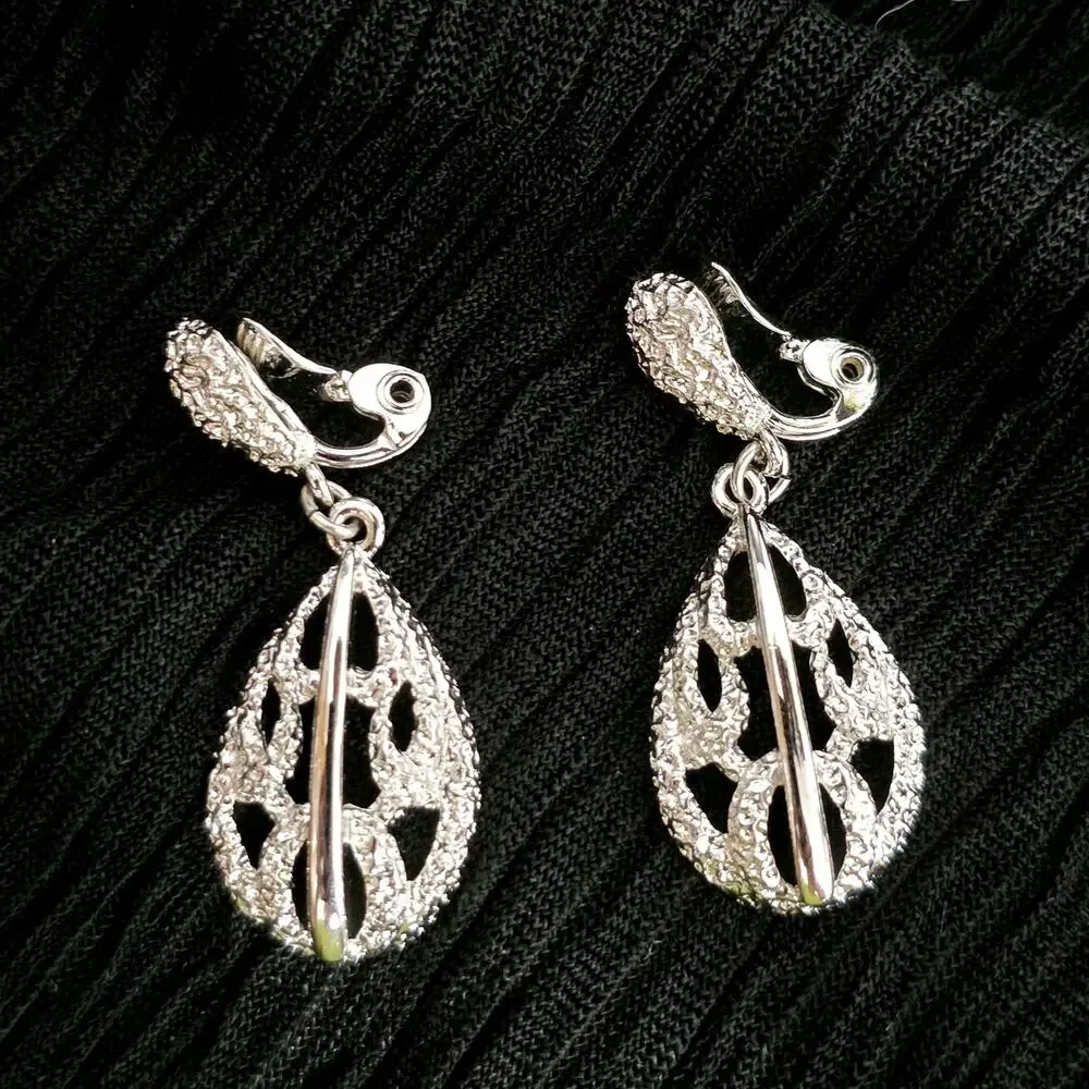 Monet Silver Tone Filigree Dangle Clip On Earrings Vintage Textured